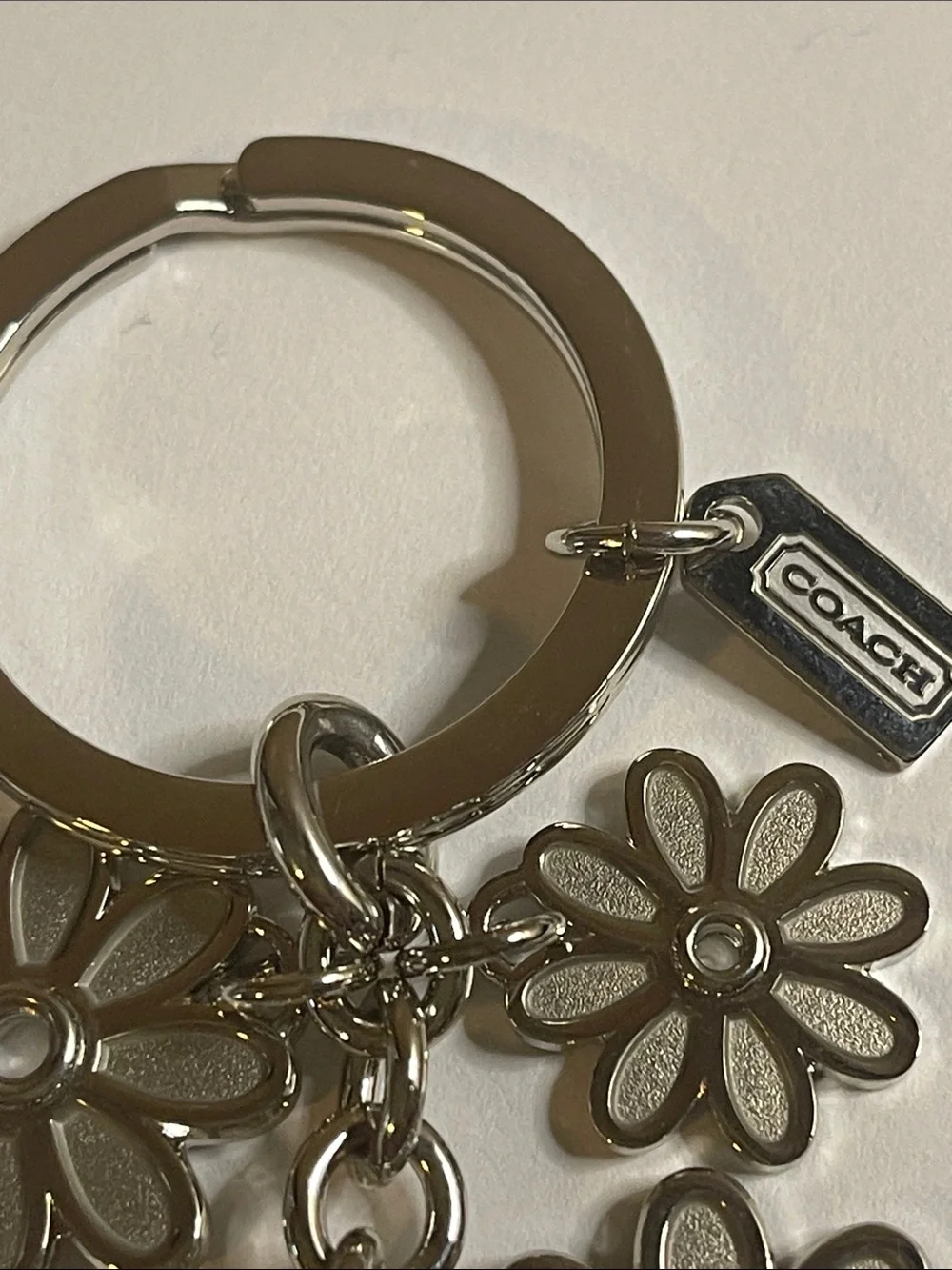Coach Silver Daisy Charm Keychain and Coach Pen
